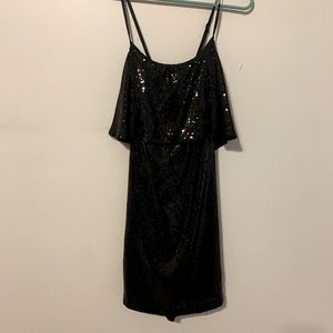 Short black party dress.